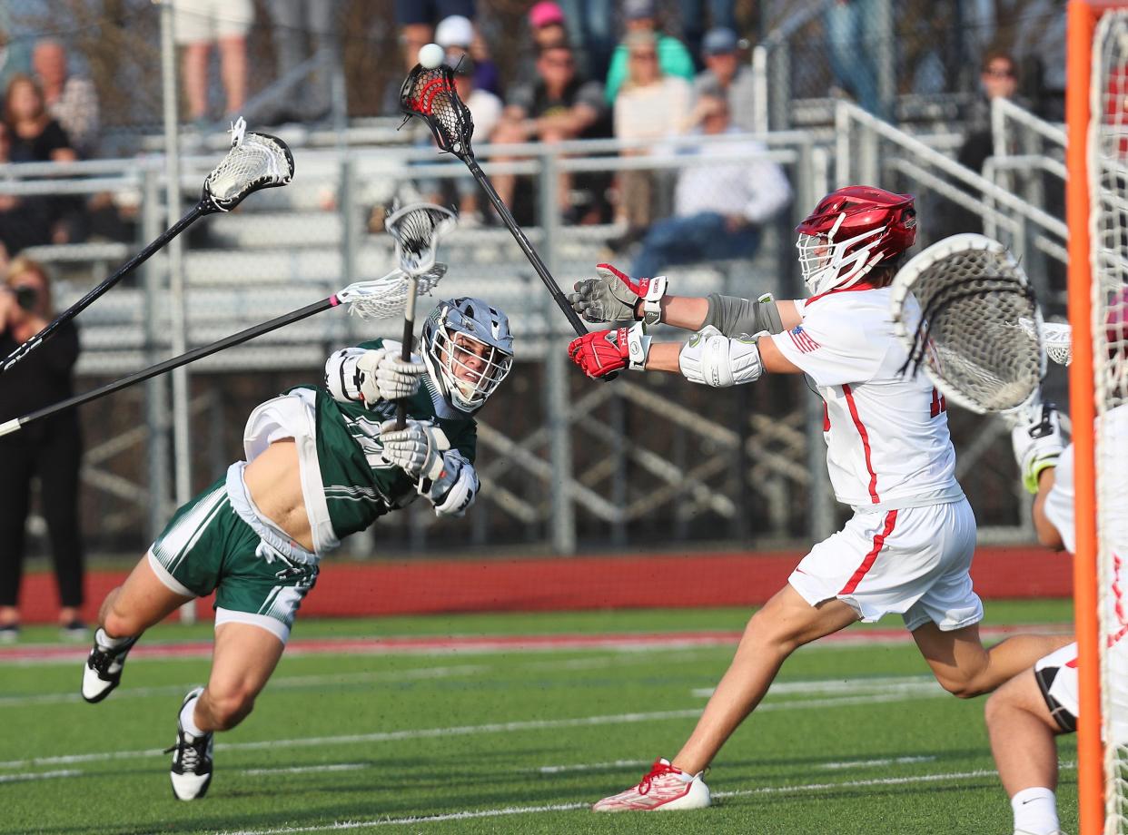 Pleasantville's Daniel Picart (10) fires a shot for a first half goal against Somers during boys lacrosse action at Somers High School April 4, 2023. Pleasantville won the game 13-5.