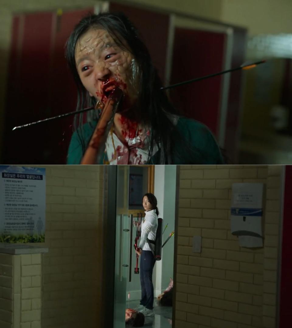 An arrow shot by Ha Seung-ri pierces the neck of a zombie