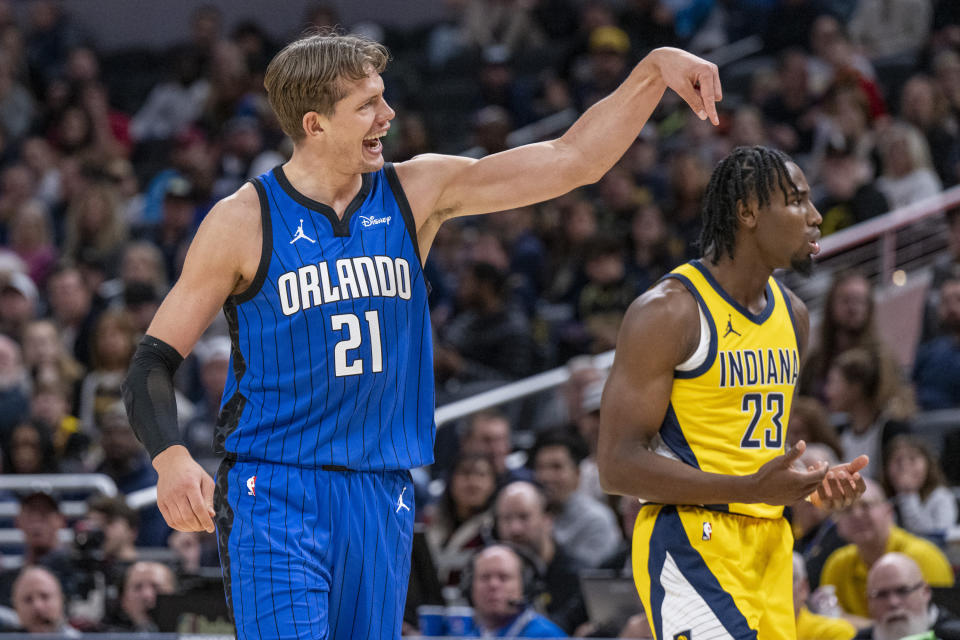 Orlando Magic center Moritz Wagner (21) reacts after a favorable call that sent him to the free-throw line during the first half of an NBA basketball game against the Indiana Pacers in Indianapolis, Sunday, Nov. 19, 2023. (AP Photo/Doug McSchooler)