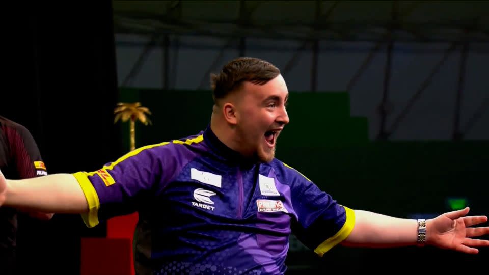 Luke Littler celebrates his nine-darter. - Official PDC/X