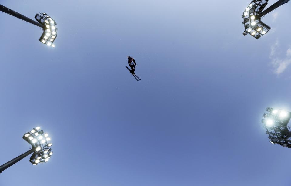 Mac Bohonnon of the United States jumps during men's aerials training at the Rosa Khutor Extreme Park, at the 2014 Winter Olympics, Sunday, Feb. 16, 2014, in Krasnaya Polyana, Russia.