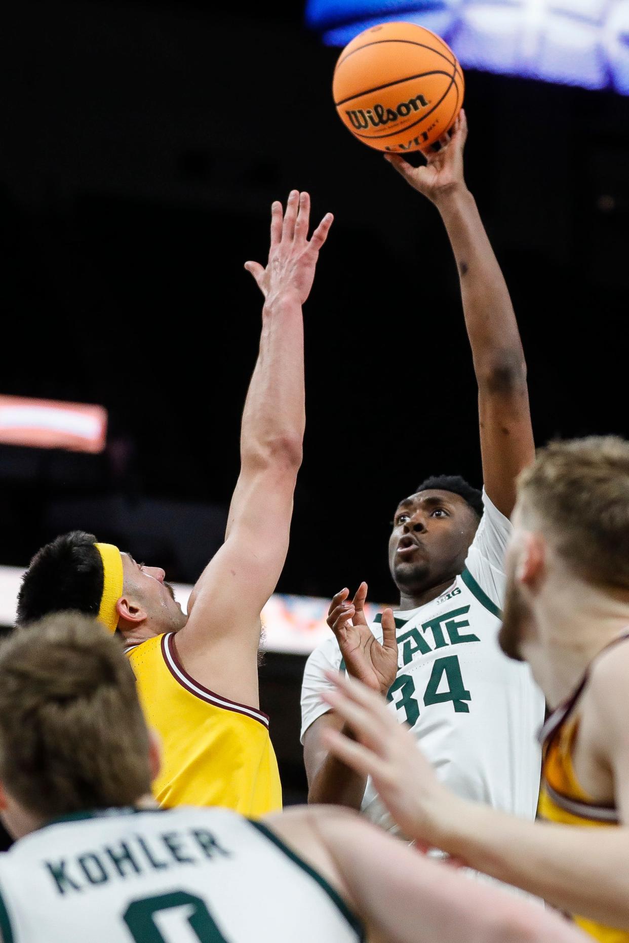 Michigan State forward Xavier Booker (34) shoots against Minnesota during the second half of Second Round of Big Ten tournament at Target Center in Minneapolis, Minn. on Thursday, March 14, 2024.
