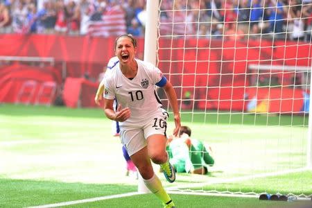 Jul 5, 2015; Vancouver, British Columbia, CAN; United States midfielder Carli Lloyd (10) reacts after scoring a goal against Japan in the first half of the final of the FIFA 2015 Women's World Cup at BC Place Stadium. Anne-Marie Sorvin-USA TODAY Sports -