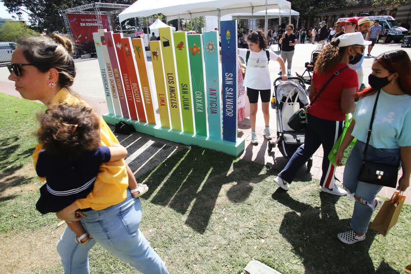 People of all ages walk around the Los Angeles Times En Espanol area during the Los Angeles Times Festival of Books at the University of Southern California in Los Angeles on Sunday, April 24, 2022. (Photo by James Carbone)