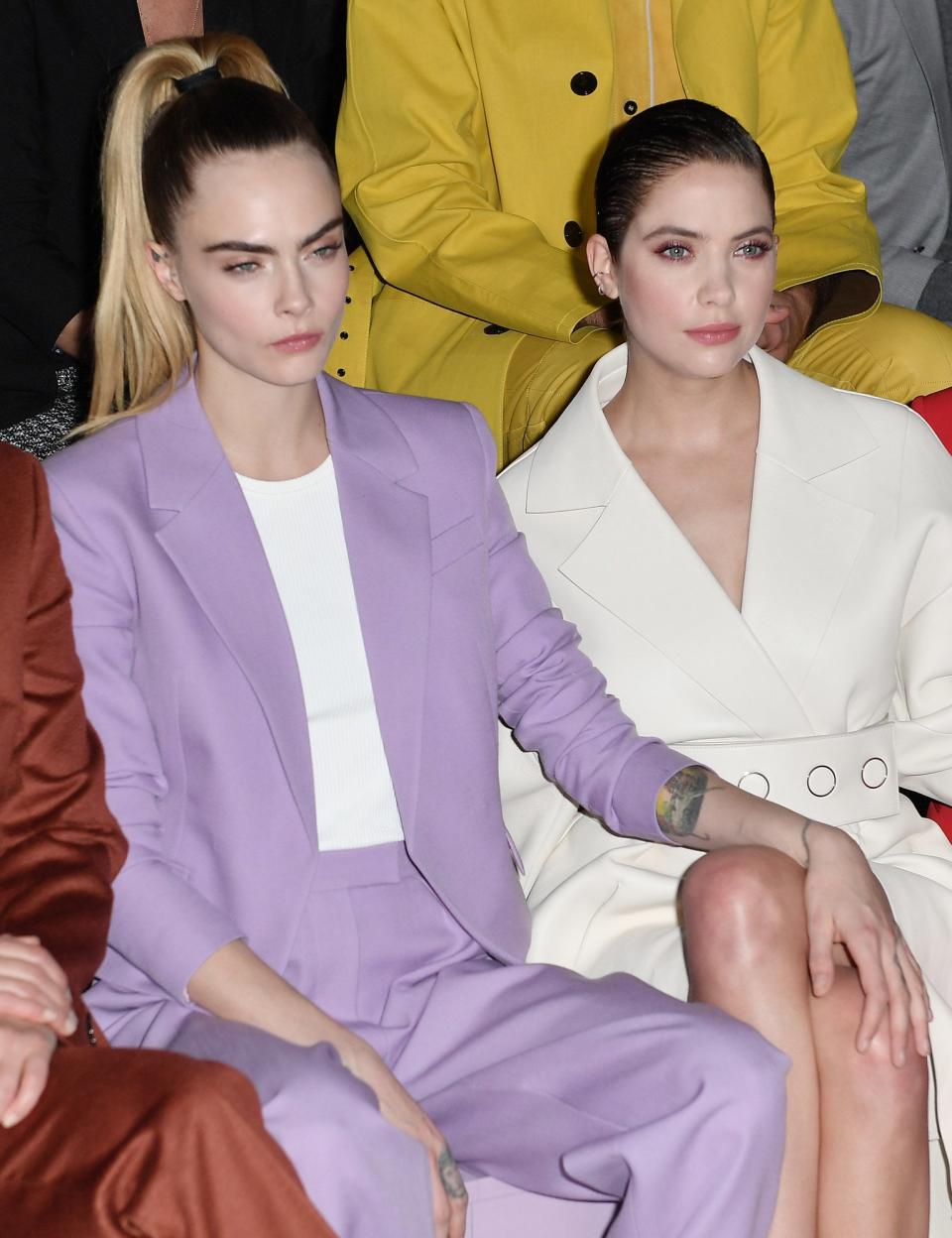 cara and ashley at a fashion show