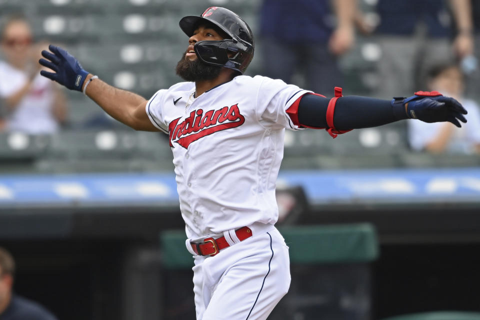 Cleveland Indians' Amed Rosario (1) celebrates after hitting a solo home run off Minnesota Twins starting pitcher J.A. Happ (33) in the second inning of a baseball game, Wednesday, April 28, 2021, in Cleveland. (AP Photo/David Dermer)