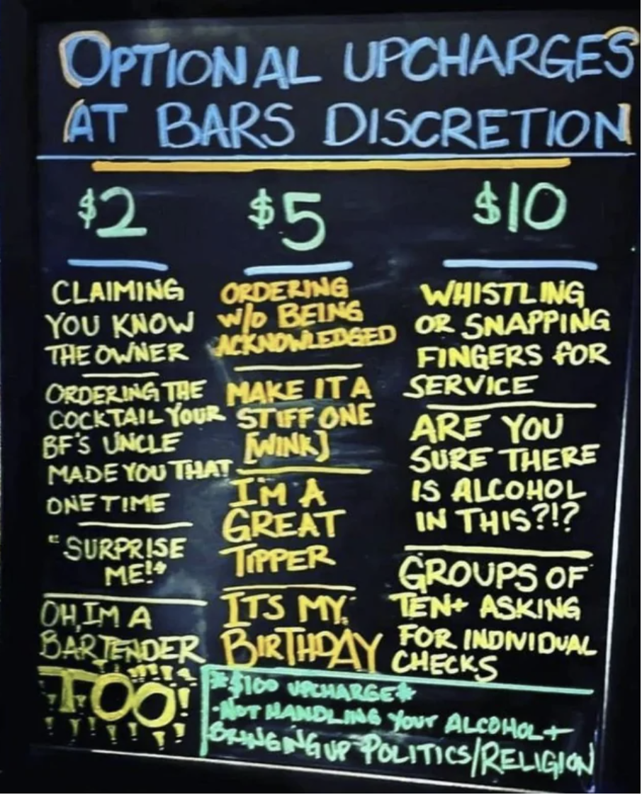 Handwriting on blackboard describing optional upcharges at bar's discretion, including $2 for claiming you know the owner, $5 for ordering without being acknowledged, and $10 for whistling or snapping fingers for service