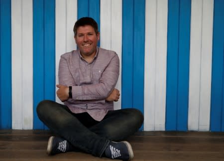 Comedian Mark Nelson poses for a photograph during an interview in Edinburgh