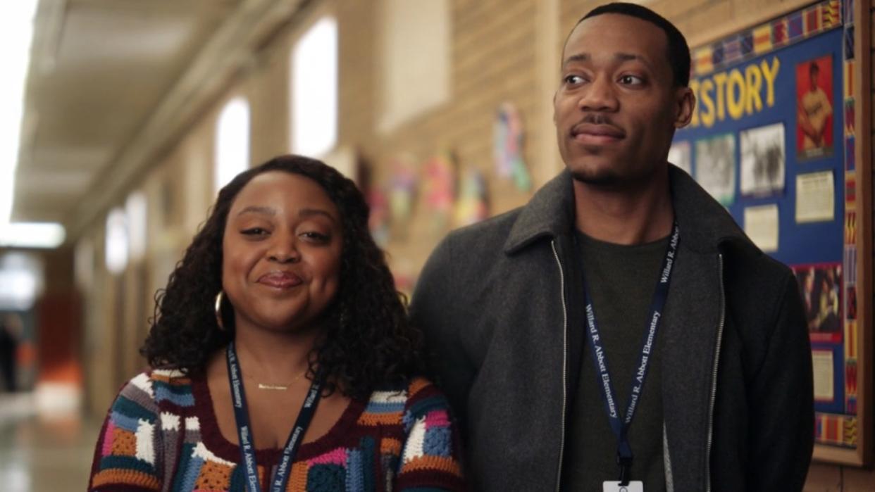  Janine and Gregory standing next to each other in Abbott Elementary 