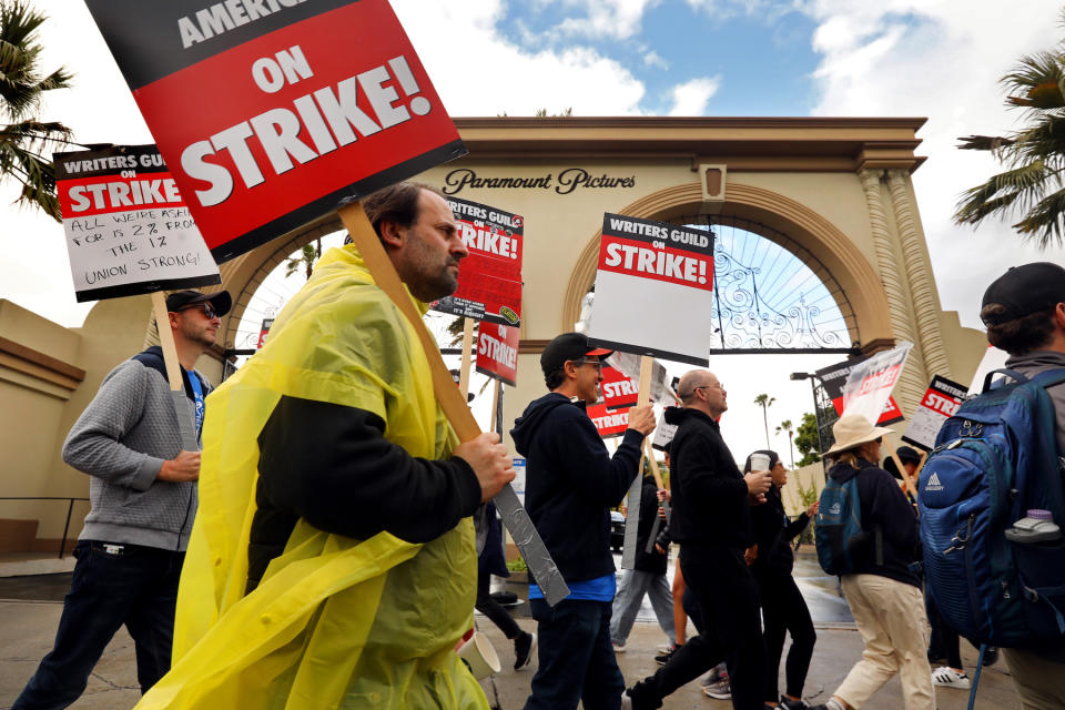 Los Angeles, California—May 4, 2023—On day three of the Writers Guild of America strike, a large group of WGA members picket in front of Paramount Studio gate in Los Angeles, California on May 4, 2023. (Carolyn Cole / Los Angeles Times)