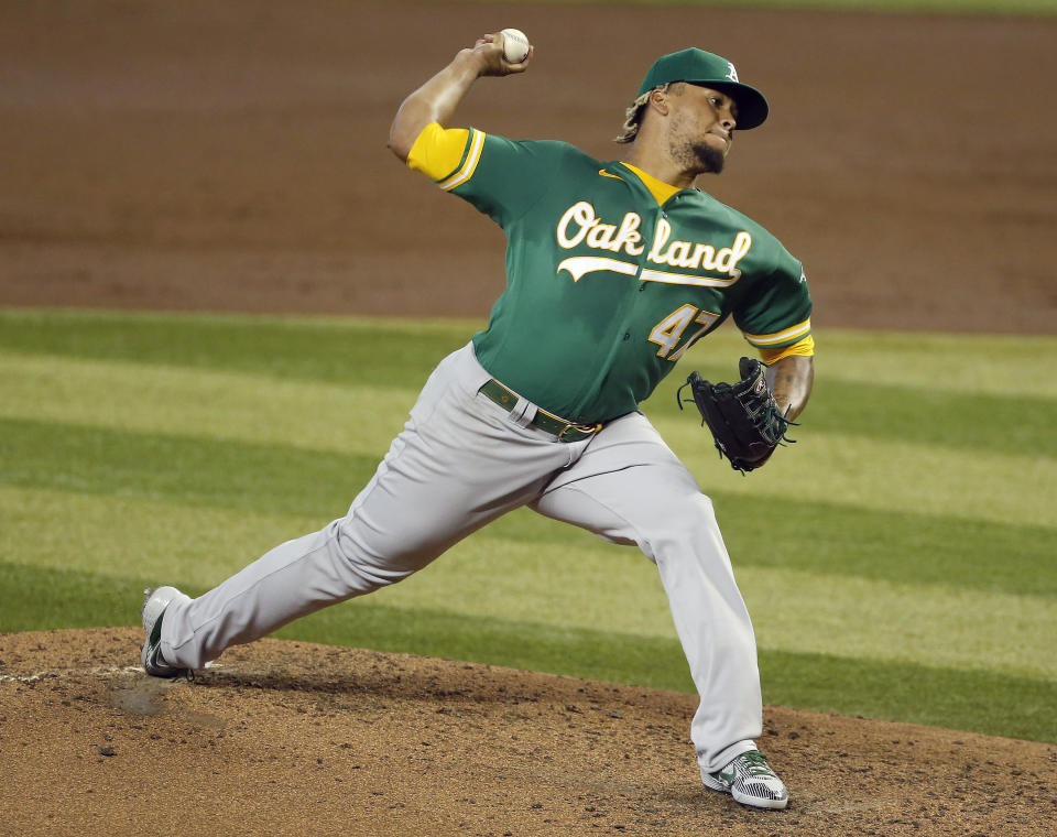 Oakland Athletics' Frankie Montas delivers a pitch against the Arizona Diamondbacks during the second inning of a baseball game Tuesday, Aug. 18, 2020, in Phoenix. (AP Photo/Darryl Webb)