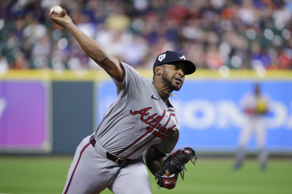 Atlanta Braves starting pitcher Darius Vines throws against the Houston Astros during the first inning of a baseball game Monday, April 15, 2024, in Houston. (AP Photo/Michael Wyke)