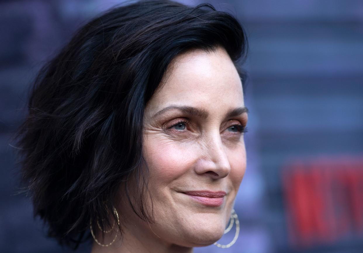 Carrie-Anne Moss says she was treated differently in Hollywood after turning 40. (Photo: VALERIE MACON/AFP via Getty Images)