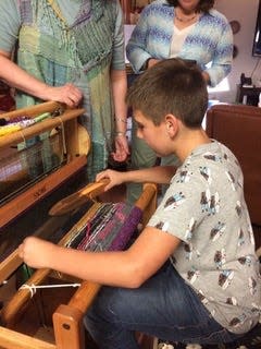 How easy is weaving? Sherrie Wilson's grandson can do it.