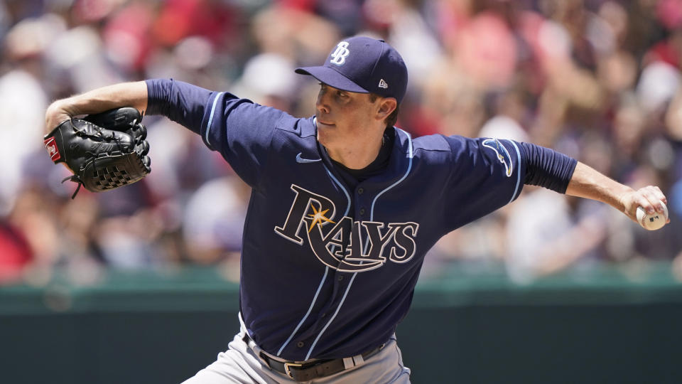 Tampa Bay Rays starting pitcher Ryan Yarbrough delivers in the first inning of a baseball game against the Cleveland Indians, Sunday, July 25, 2021, in Cleveland. (AP Photo/Tony Dejak)