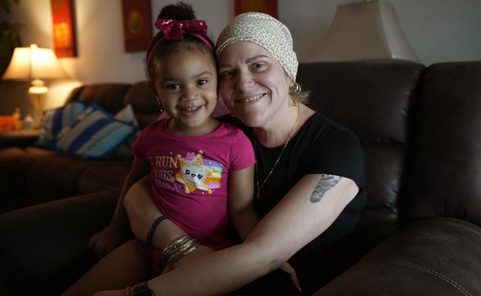 Liana Curbelo, 31, and her 3-year-old daughter, Sky, at their apartment in West Palm Beach. Liana, a single mom, is battling Stage 3 breast cancer. Wednesday, Nov. 8, 2022 in West Palm Beach.