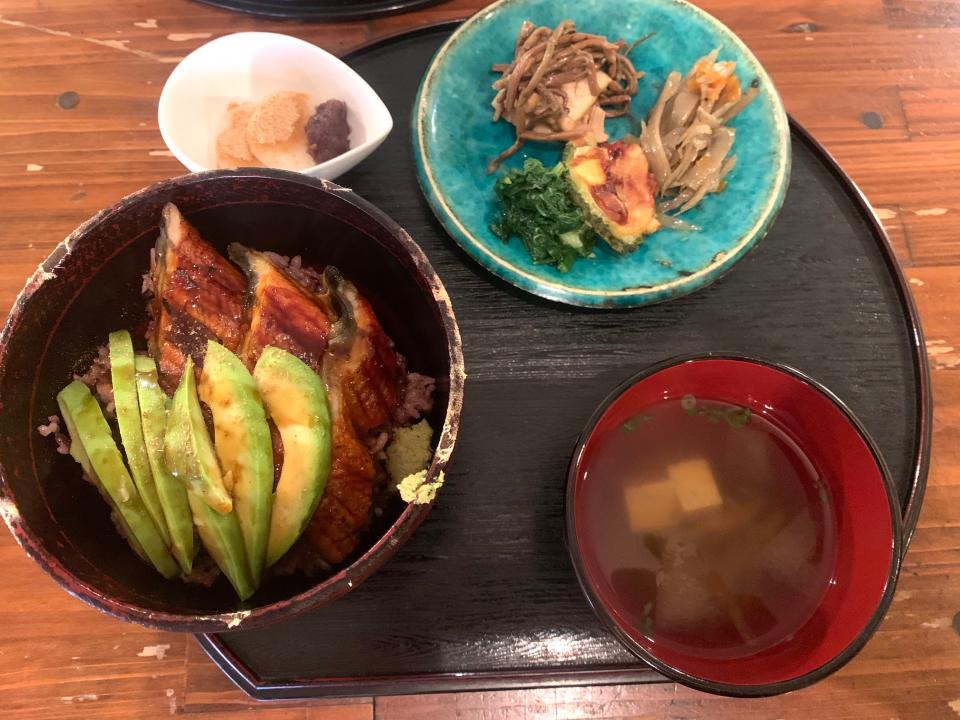 Eel donburi with healthy vegetables including bitter melon, miso soup and movhi dessert .jpg