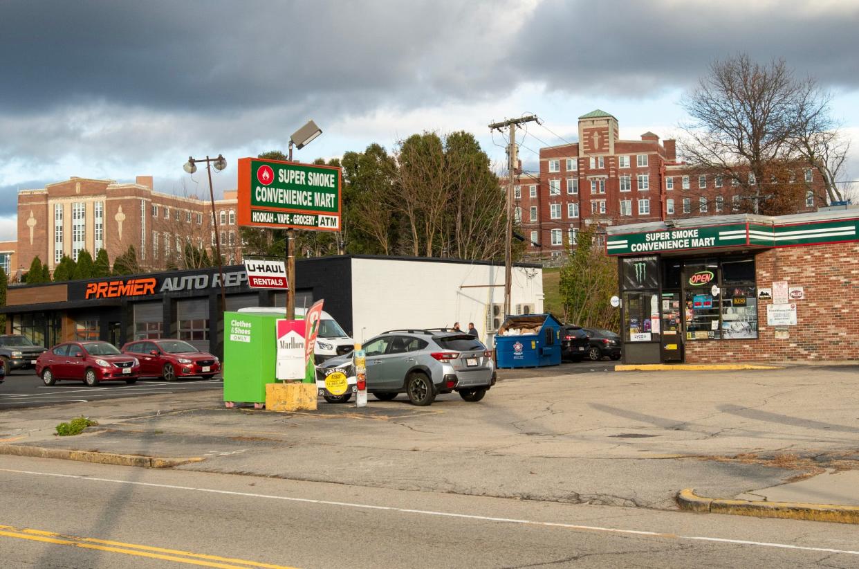 Super Smoke Convenience Mart now fills the corner of West Boylston Street and Assumption Avenue. Quinsigamond Community College is in background.