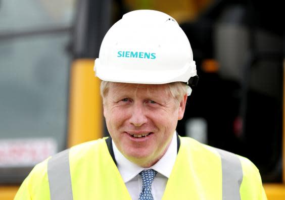 Prime Minister Boris Johnson, during a visit to the Siemens Rail factory construction site in Goole, Yorkshire, on Monday (PA)