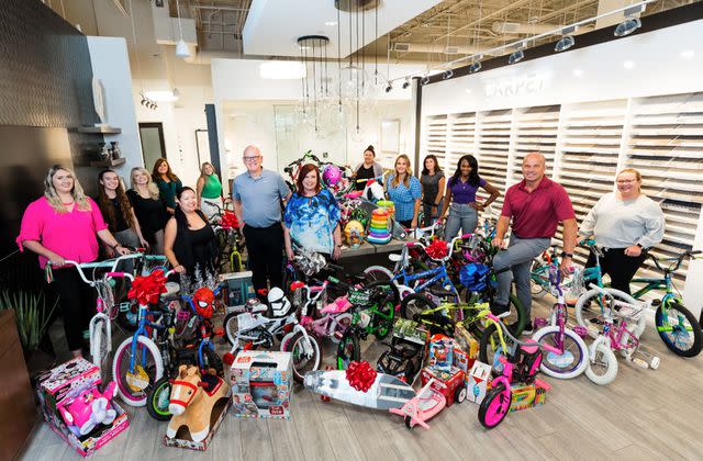 <p>Tri Pointe Homes</p> Tri Pointe staffers in Las Vegas hold a toy drive to benefit HELP of Southern Nevada.