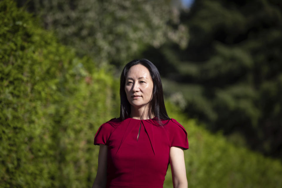 Meng Wanzhou, chief financial officer of Huawei, leaves home for B.C. Supreme Court to attend her extradition hearing, Tuesday, Aug. 10, 2021, in Vancouver, British Columbia. (Darryl Dyck/The Canadian Press via AP)