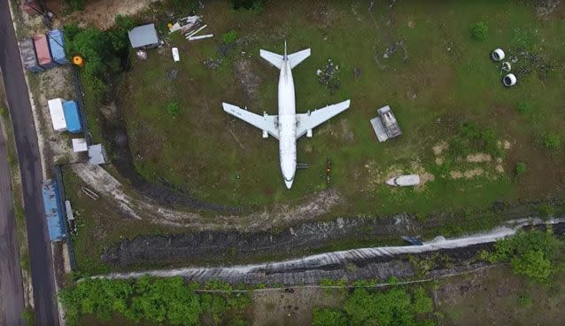 It's one of two abandoned Boeing 737s in Bali. Source: YouTube/ ExploringWithJosh