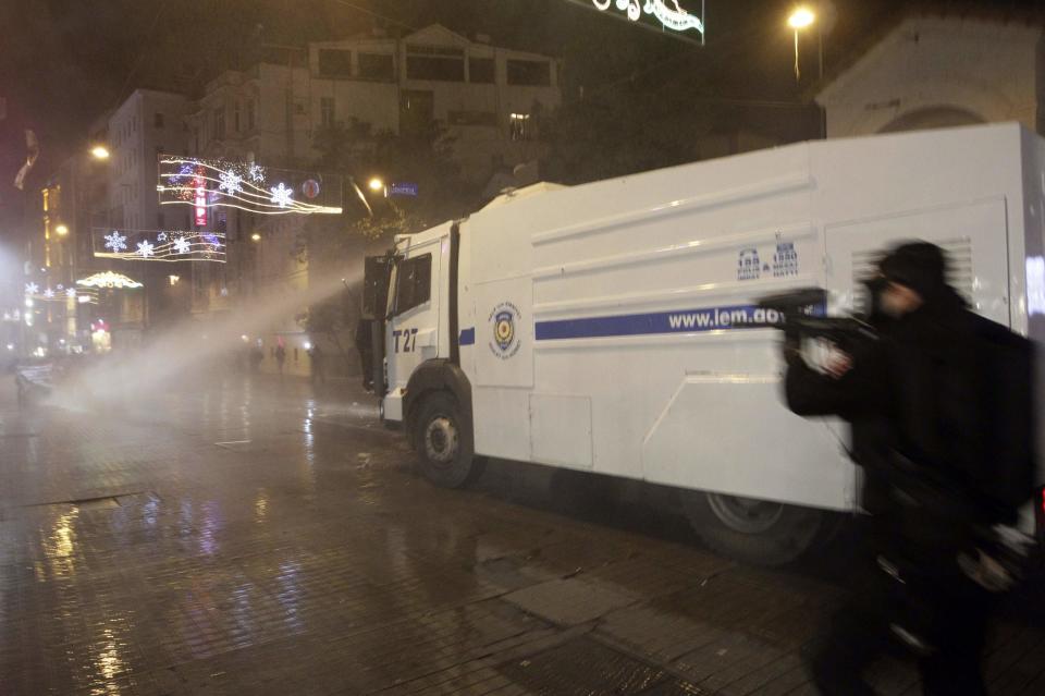 Riot police use water cannons to disperse demonstrators during a protest against internet censorship in Istanbul