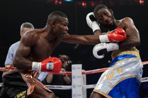 Cuba's Guillermo Rigondeaux (L) during his WBA super-bantamweight title fight against Teon Kennedy on June 9. Rigondeaux retained his super-bantamweight world title with a fifth-round technical knockout of Kennedy