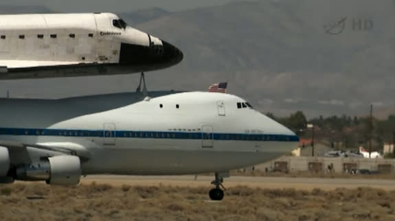 A close-up of NASA's space shuttle Endeavour riding atop its Shuttle Carrier Aircraft just after landing at NASA's Dryden Flight Research Facility near Edwards Air Force Base in Southern California on Sept. 20, 2012. Endeavour is headed to its