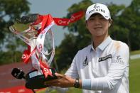 Park Sung-hyun with the trophy after winning the HSBC Women's World Championship in Singapore on March 3, 2019, the last time the tournament was held before the coronavirus pandemic