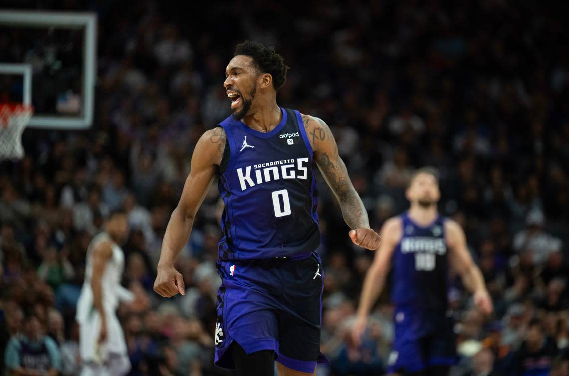 Sacramento Kings guard Malik Monk (0) reacts a after a three-point basket during a game against the Milwaukee Bucks at Golden 1 Center on Tuesday, March 12, 2024 in Sacramento.