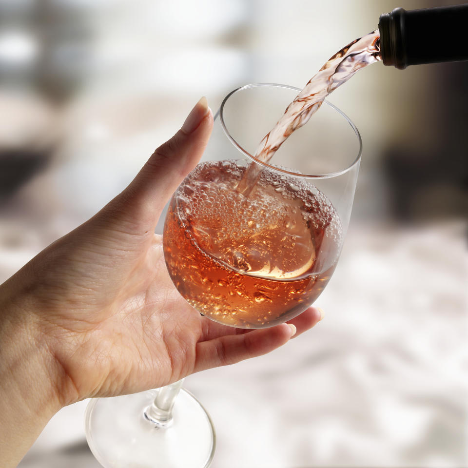 Pour it up, rosé is the mid-week wine that’ll last in your fridge until the weekend. Photo: Getty