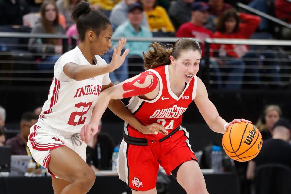 Ohio State guard Taylor Mikesell dribbles past Indiana's Chloe Moore-McNeil.
