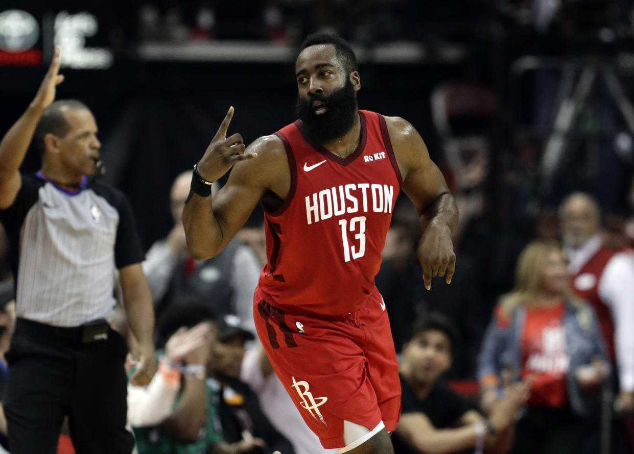 Houston Rockets' James Harden (13) celebrates a basket against the Golden State Warriors during the first half in Game 6 of a second-round NBA basketball playoff series, Friday, May 10, 2019, in Houston. (AP Photo/Eric Gay)
