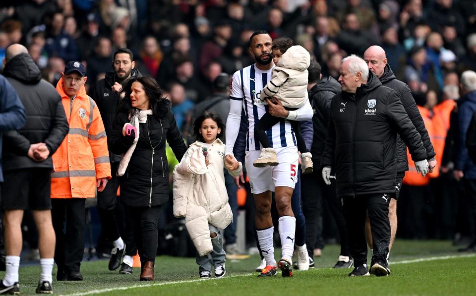 West Brom v Wolves crowd trouble: police use batons as players are called off the pitch