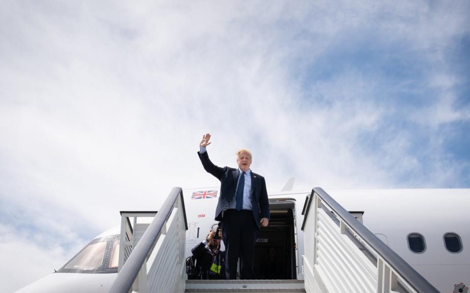 Boris Johnson is pictured leaving the Nato summit in Madrid yesterday - Getty Images Europe/WPA Pool 