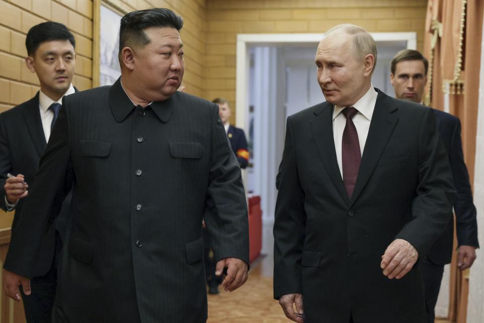 Russian President Vladimir Putin, right, and North Korea's leader Kim Jong Un talk to each other during their meeting in Pyongyang, North Korea, on Tuesday, June 18, 2024. (Gavriil Grigorov, Sputnik, Kremlin Pool Photo via AP)
