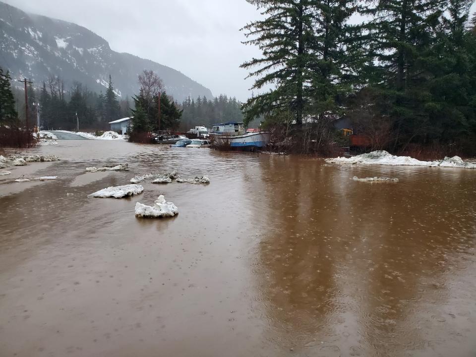 This photo provided by the Alaska Department of Transportation and Public Facilities shows damage from heavy rains and a mudslide 600 feet wide in Haines, Alaska, on Wednesday, Dec. 2, 2020. Authorities say six people are unaccounted for, and four homes were destroyed in the slide, with the search resuming Thursday morning for survivors. (Matt Boron/Alaska Department of Transportation and Public Facilities via AP)