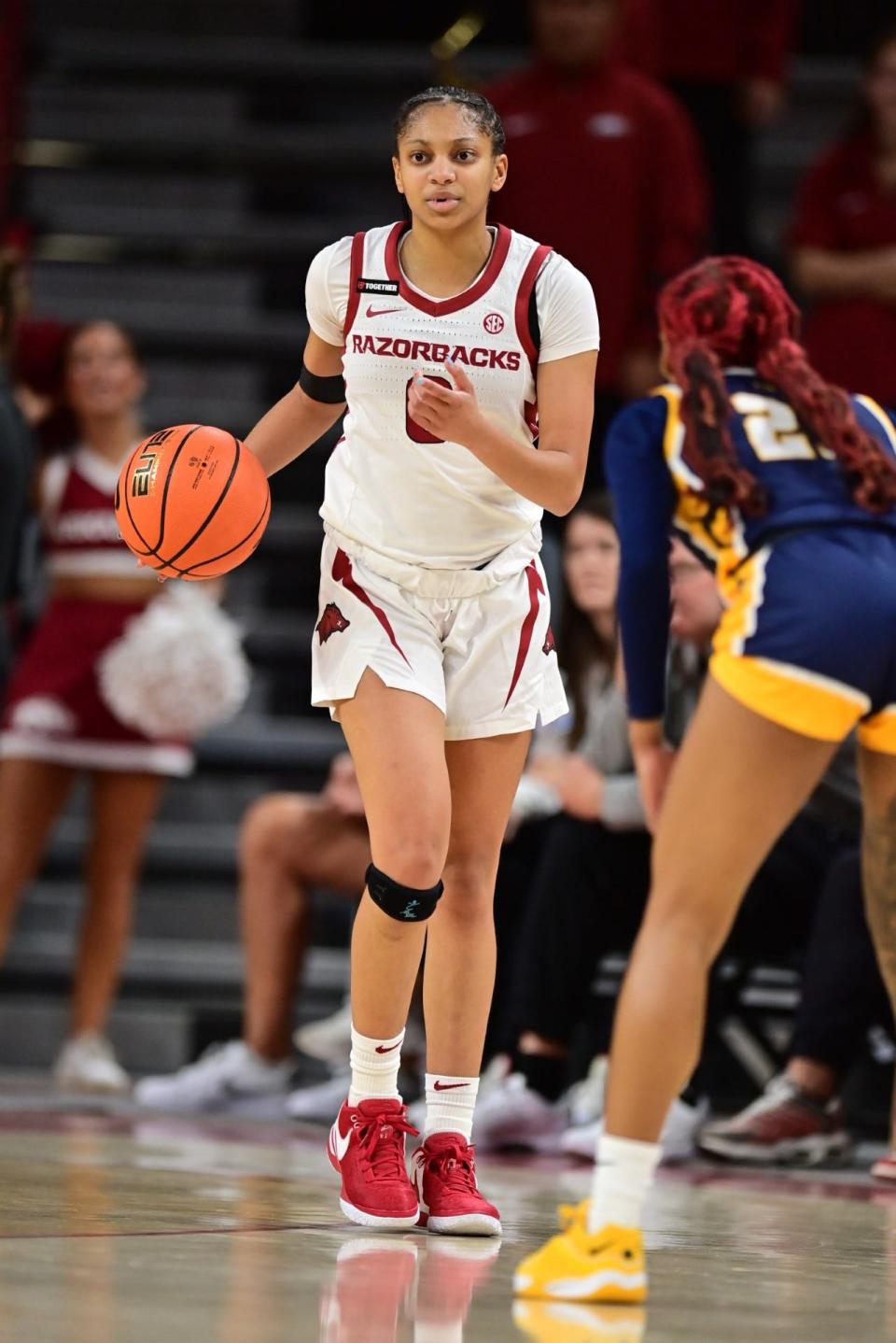 Taliah Scott brings the ball up the floor during the Arkansas women's basketball team's 82-79 win over Murray State Friday.