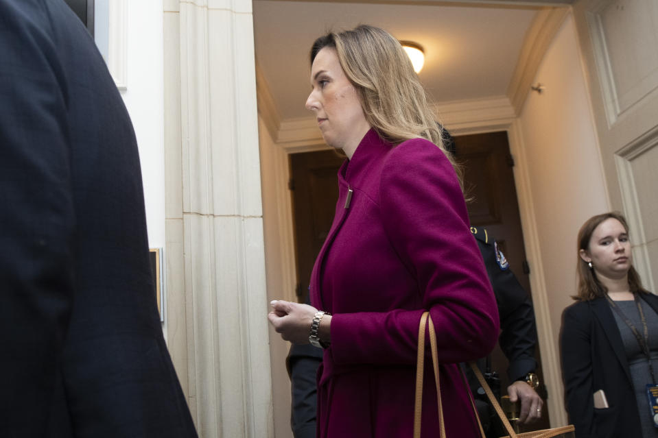 Jennifer Williams, an aide to Vice President Mike Pence, arrives to testify before the House Intelligence Committee on Capitol Hill in Washington, Tuesday, Nov. 19, 2019, during a public impeachment hearing of President Donald Trump's efforts to tie U.S. aid for Ukraine to investigations of his political opponents. (AP Photo/Manuel Balce Ceneta)