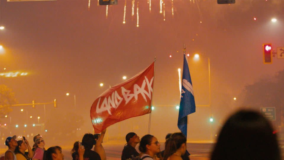 A still from the documentary "Lakota Nation vs the United States" shows protestors demanding land be returned to the Indigenous people. - IFC Films