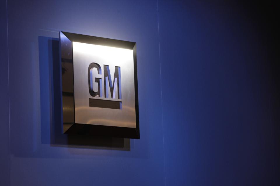 FILE - In this Jan. 12, 2009, file photo, the General Motors logo is on display at the North American International Auto Show in Detroit. As General Motors executives show off their newest cars and trucks in New York this week, analysts are watching for signs that consumers are shying away from the ones sitting on dealer lots. (AP Photo/Paul Sancya, File)