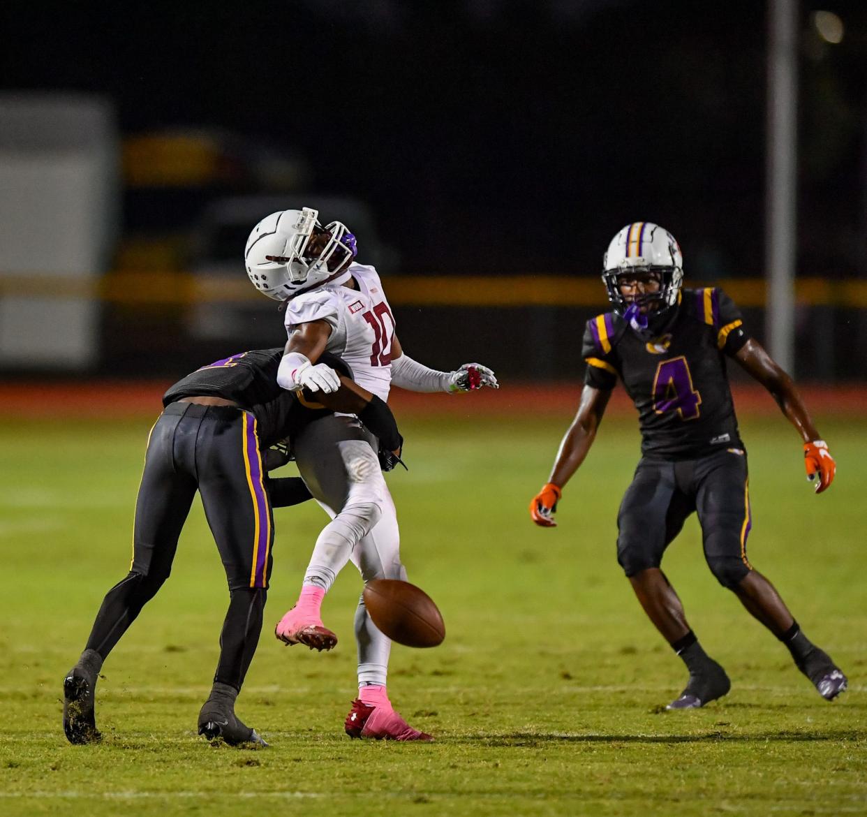 Fort Pierce Central's Devyn Ingle (left) makes a tackle against Westwood in a high school football game, Friday, Oct. 20, 2023, at Lawnwood Stadium.