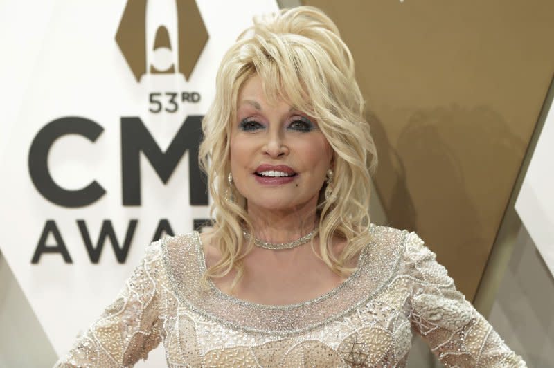 Dolly Parton arrives for the 52nd Annual Country Music Association Awards at Bridgestone Arena in Nashville on November 13, 2019. The singer turns 77 on January 19. File Photo by John Angelillo/UPI