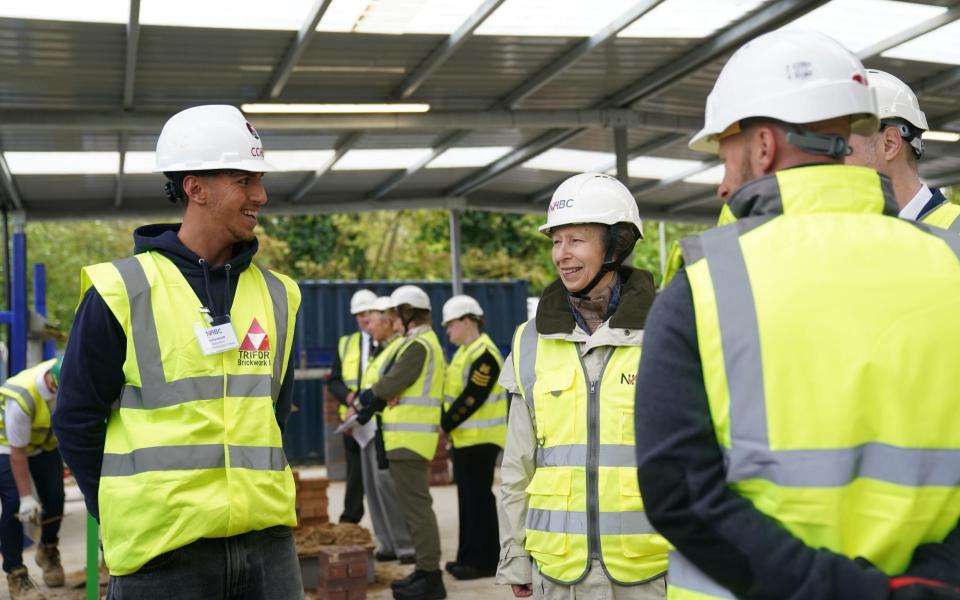 The Princess Royal meets apprentice Corey Ratcliff at the NHBC Training Hub in Cambridge