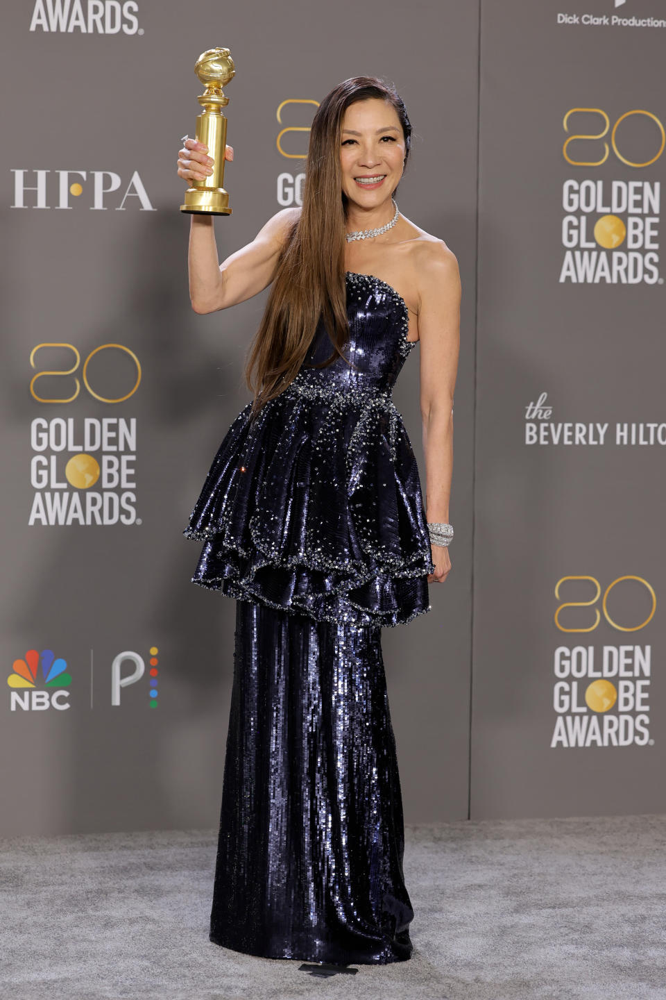 Yeoh's gown for the 80th Golden Globe Awards featured a tiered silhouette, with several embroidered crystals and sequins. (Photo by Amy Sussman/Getty Images)