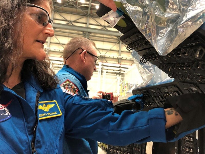 Suni and Butch work alongside Boeing engineers in preparation for the upcoming crewed flight test. This photo was taken in February of 2023. Photo courtesy of Boeing.