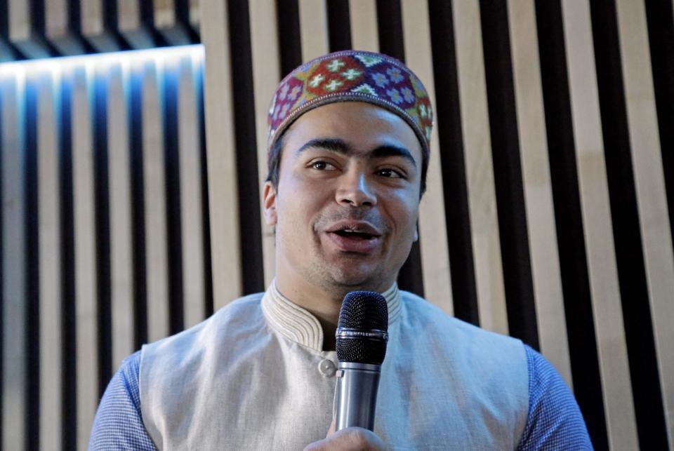 India's Shiva Keshavan speaks at a luncheon at the 2014 Winter Olympics, Tuesday, Feb. 11, 2014, in Sochi, Russia. Keshavan competed in the men's singles luge under the Olympic flag because India's Olympic body had been suspended by the IOC in 2012 over a corruption scandal. The IOC executive board reinstated the Indian Olympic body on Tuesday, Feb. 11, 2014, after it held a weekend ballot that complied with ethics rules barring corruption-tainted officials from running for election. (AP Photo/Morry Gash)