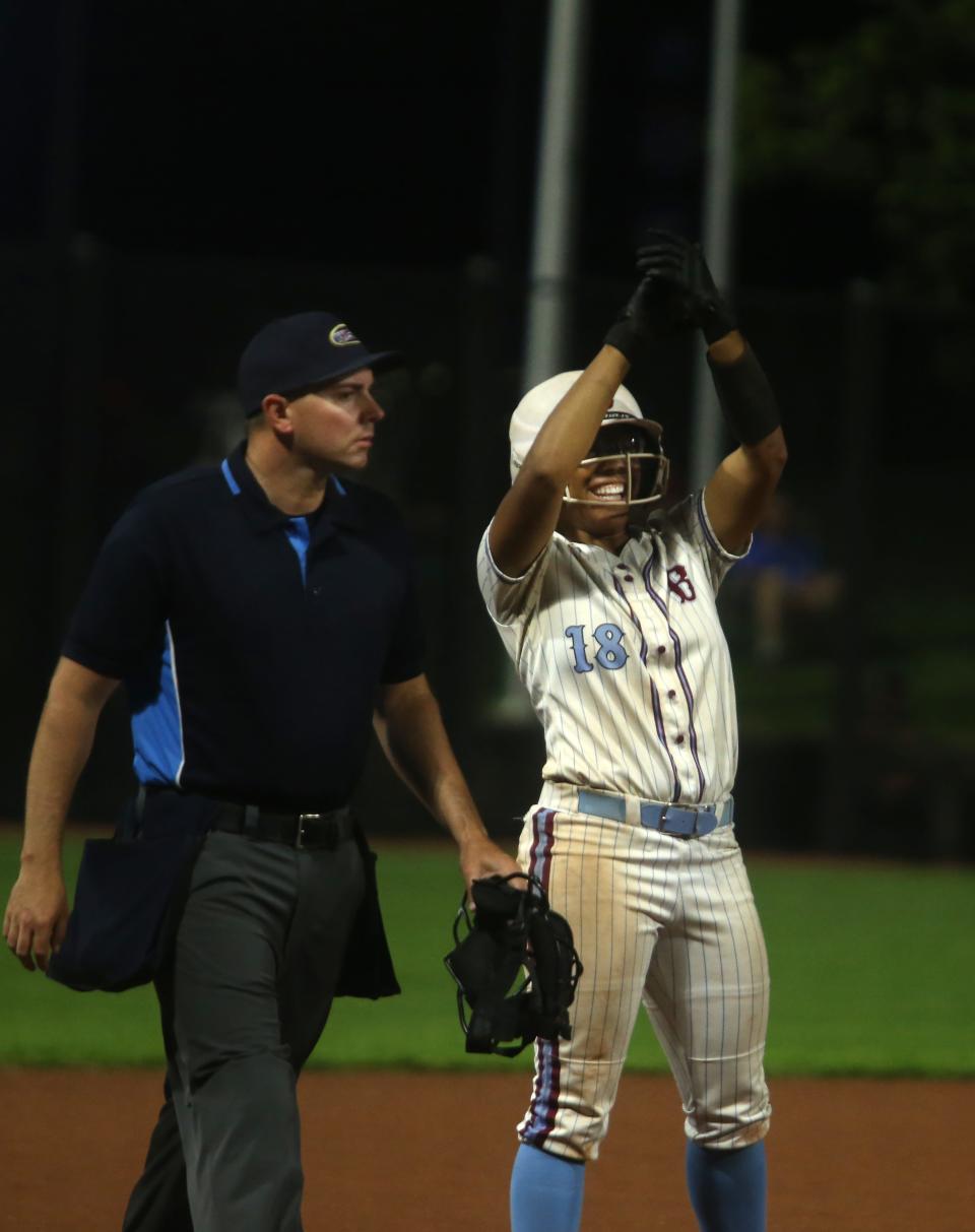 Ballard’s Imari Golden celebrates hitting a triple and knocking in a run against Eastern in the 7th Region Championship.May 23, 2023