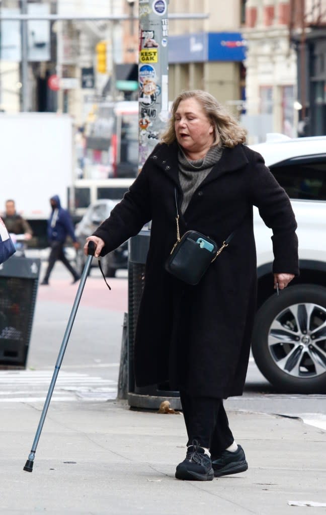 Turner, 69, wore a long black overcoat and used a cane as she walked on Canal Street and Broadway. BrosNYC / BACKGRID